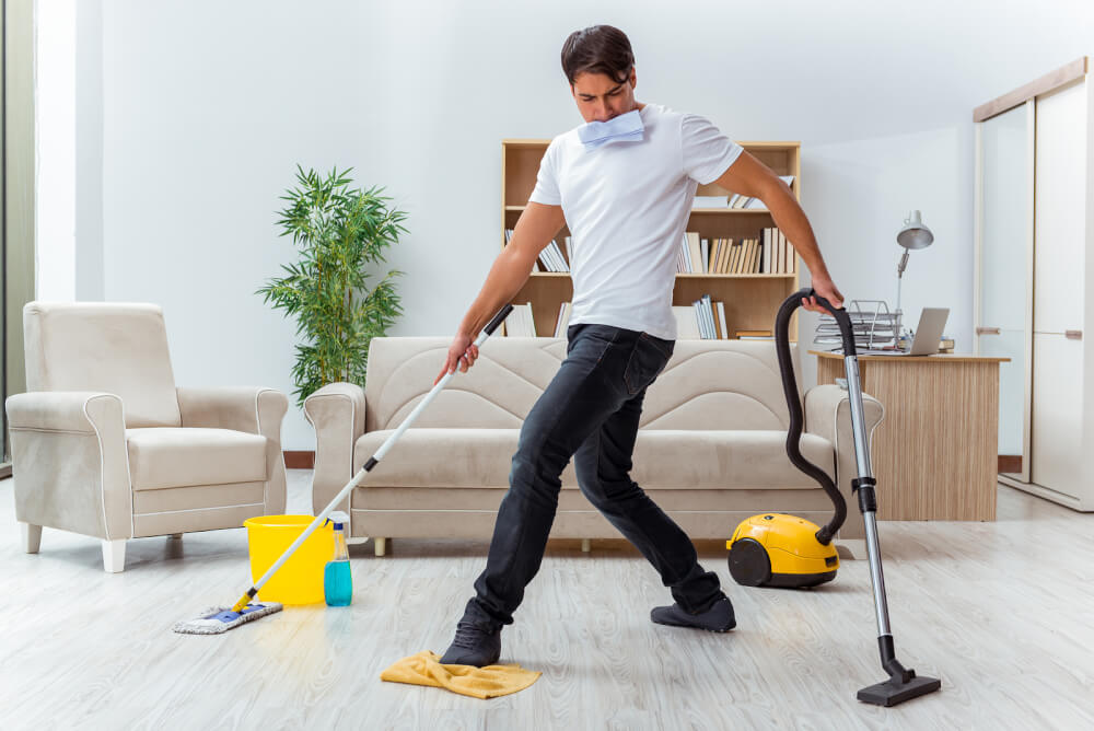 bigstock-Man-husband-cleaning-the-house-168555137.jpg