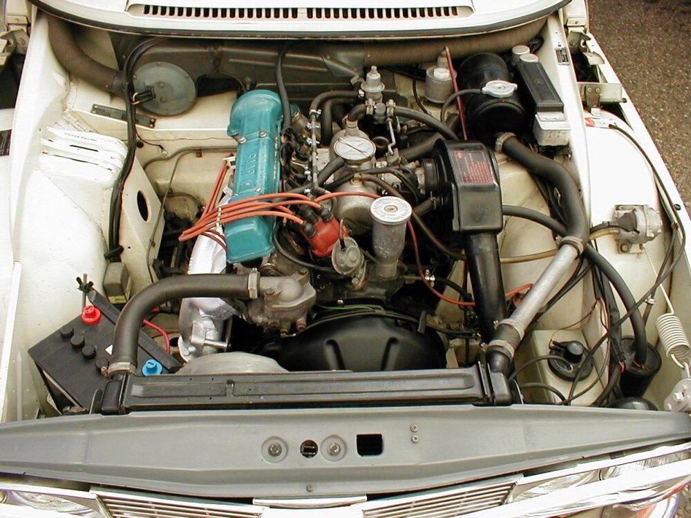 Saab_99_1971_motor_2.thumb.jpg.fcbc06dd0492836341a6304ab574514e.jpg