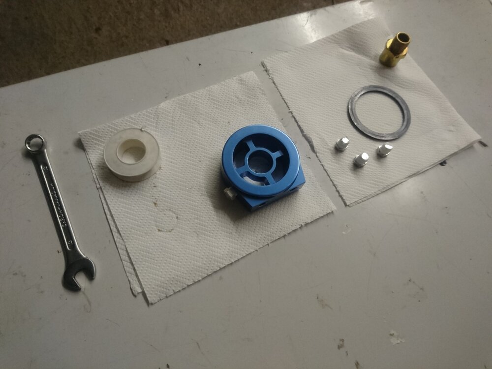 oelfilter_adapter_01.thumb.jpg.3a99ff5e958afe1007389026053b3972.jpg